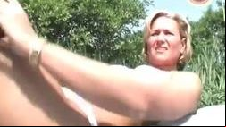 Horny mature blonde rubs and shaves her