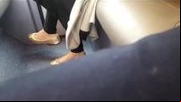 Flashing feet in bus